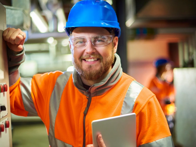 Civil construction worker in blue hard hat
